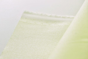 Cotone avorio stretch effetto glitterato