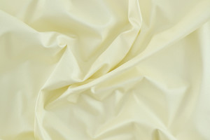 Cotone avorio stretch effetto glitterato