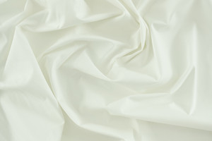 Popeline di cotone stretch bianco panna