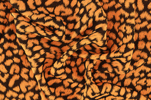 Crêpe jacquard maculato nero-arancione