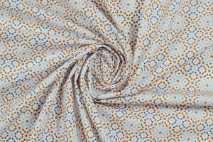 Popeline puro cotone motivo geometrico ocra e blu