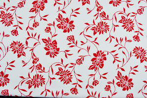 Gabardine di cotone stretch bianco a grandi fiori rossi