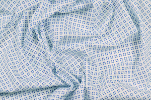 Popeline stretch da camiceria motivo geometrico blu