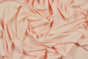 Jersey di cotone bi-stretch rosa pesca chiaro