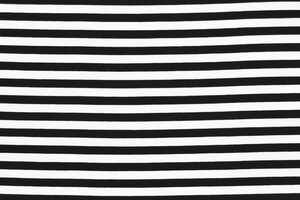 Jersey di cotone bi-stretch a righe bianco e nero