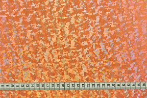 Lycra arancione con micro-paillettes cangianti