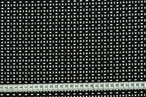 Popeline di puro cotone nero motivo geometrico traforato