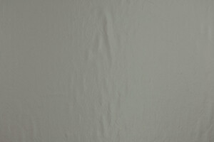 Tessuto leggero spalmato grigio-lilla metallizzato