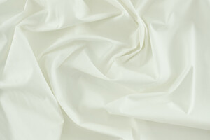 Popeline di cotone stretch bianco panna
