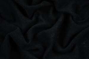 Maglia di lana cardata nera semi-trasparente