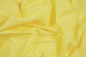 Popeline da camiceria in puro cotone bianco a micro-quadretti gialli