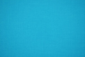 Tela leggera di cotone azzurro ciano