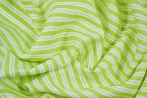 Puro lino a righe in bianco e verde pistacchio tinto filo