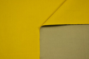 Drill di cotone spalmato giallo curry