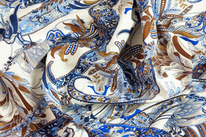 Popeline di cotone con fantasia paisley e floreale