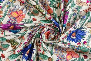 Popeline di cotone con stampa flora e fauna